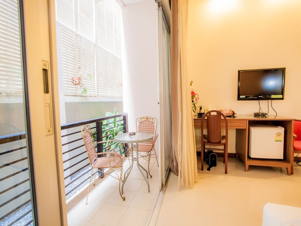 Imagen de la habitación del Hotel Kata Blue Sea Resort. Foto 14