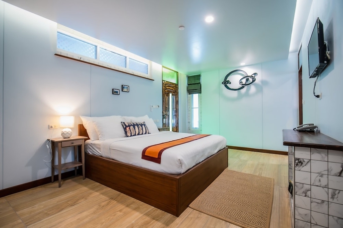 Imagen de la habitación del Hotel Kata Tranquil Villa. Foto 2