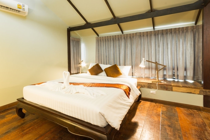 Imagen de la habitación del Hotel Kata Tranquil Villa. Foto 5