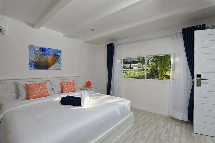 Imagen de la habitación del Hotel Kata White Villas. Foto 17