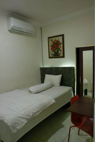 Imagen de la habitación del Hotel Katalia Tomang. Foto 6