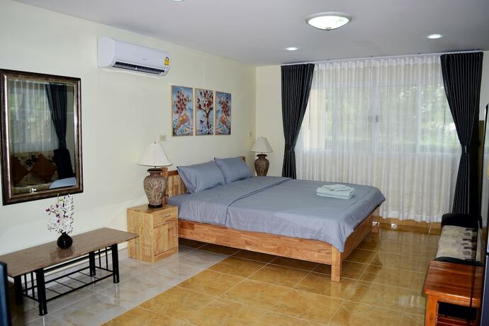 Imagen de la habitación del Hotel Kate House Bangsaphan. Foto 12