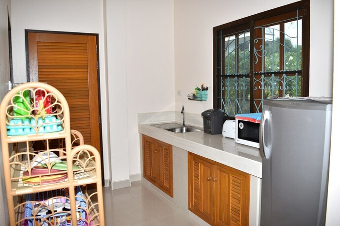 Imagen de la habitación del Hotel Kate House Bangsaphan. Foto 18