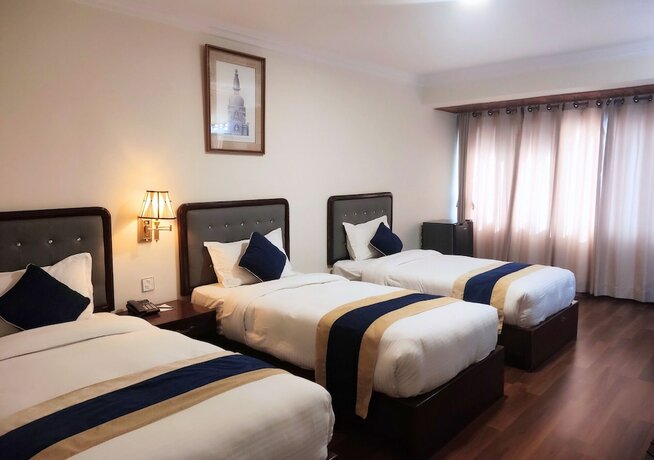 Imagen de la habitación del Hotel Kathmandu Business. Foto 11