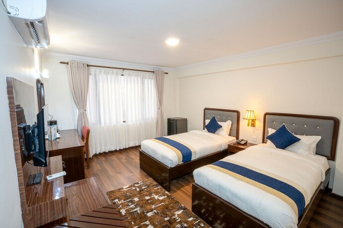 Imagen de la habitación del Hotel Kathmandu Business. Foto 19