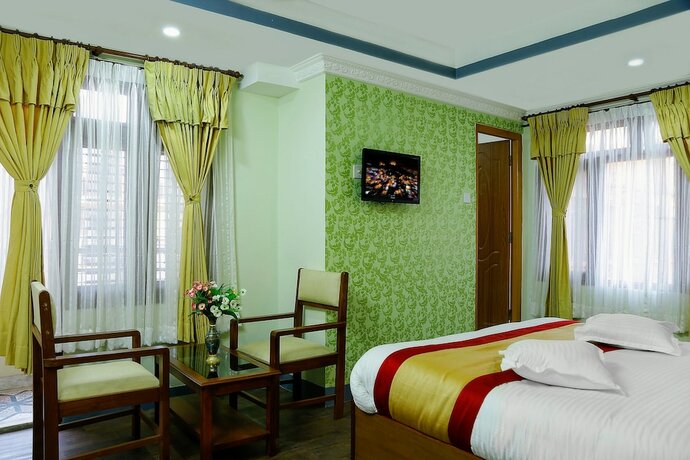 Imagen de la habitación del Hotel Kathmandu Garden Home. Foto 13