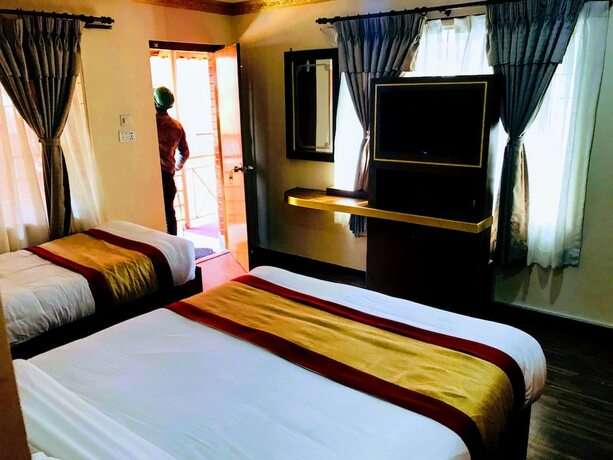 Imagen de la habitación del Hotel Kathmandu Garden Home. Foto 19