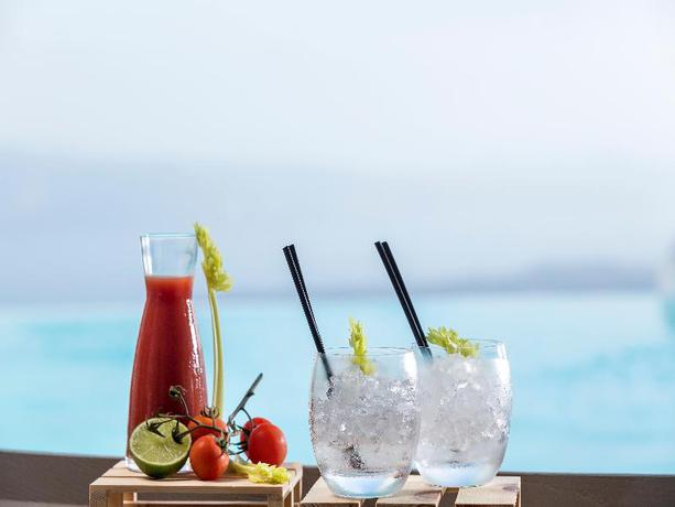 Imagen del bar/restaurante del Hotel Katikies Chromata Santorini - The Leading Hotels Of The World. Foto 3