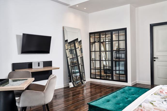 Imagen de la habitación del Hotel Katikies Garden Santorini. Foto 4