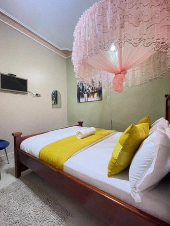 Imagen de la habitación del Hotel Katro City Suites. Foto 4