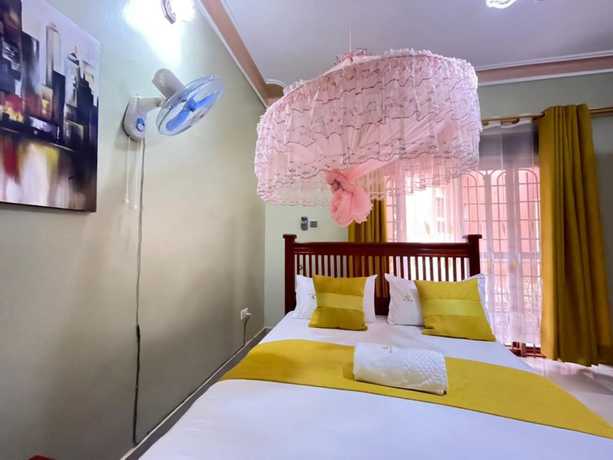 Imagen de la habitación del Hotel Katro City Suites. Foto 6