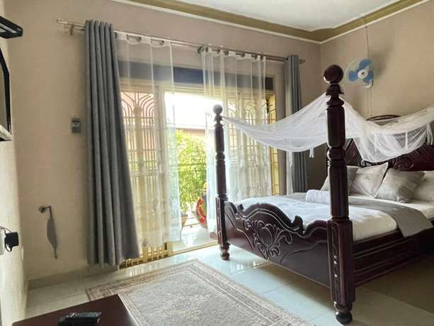 Imagen de la habitación del Hotel Katro City Suites. Foto 7