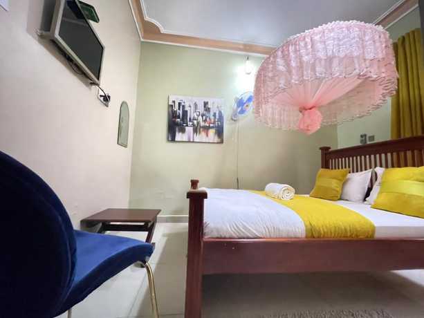 Imagen de la habitación del Hotel Katro City Suites. Foto 9