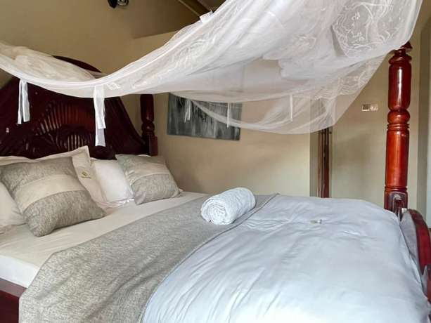 Imagen de la habitación del Hotel Katro City Suites. Foto 12