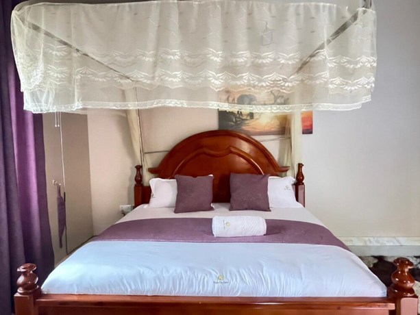 Imagen de la habitación del Hotel Katro City Suites. Foto 13