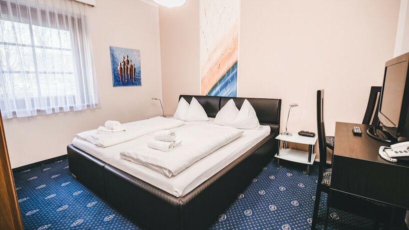 Imagen de la habitación del Hotel Kärntnerhof Velden by S4Y. Foto 12