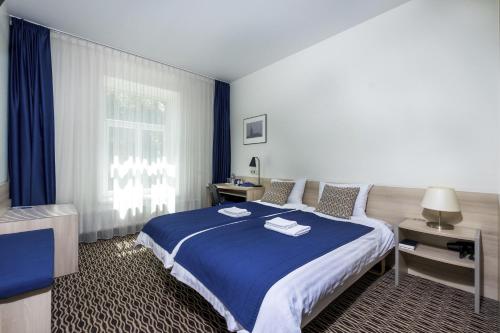 Imagen de la habitación del Hotel Kaunas City. Foto 9