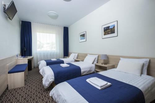 Imagen de la habitación del Hotel Kaunas City. Foto 10