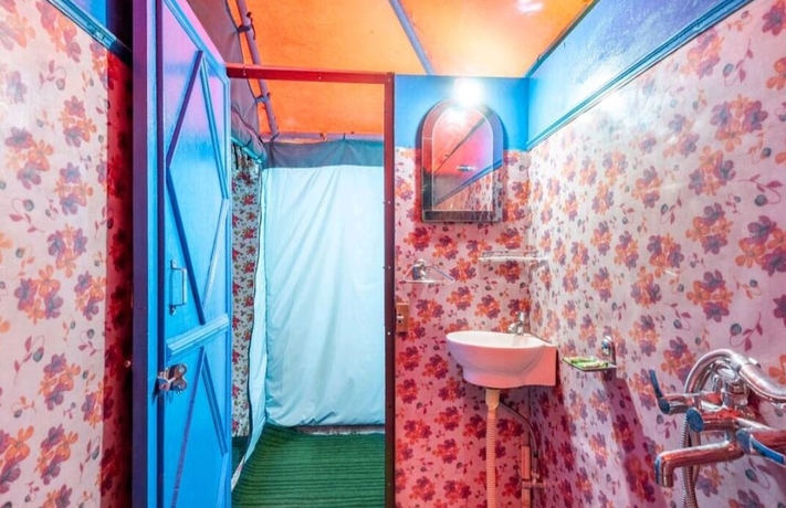 Imagen de la habitación del Hotel Kausani Adventure And Camping. Foto 12