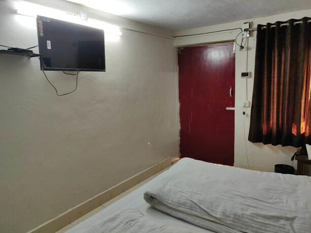 Imagen de la habitación del Hotel Kausani Retreat. Foto 19