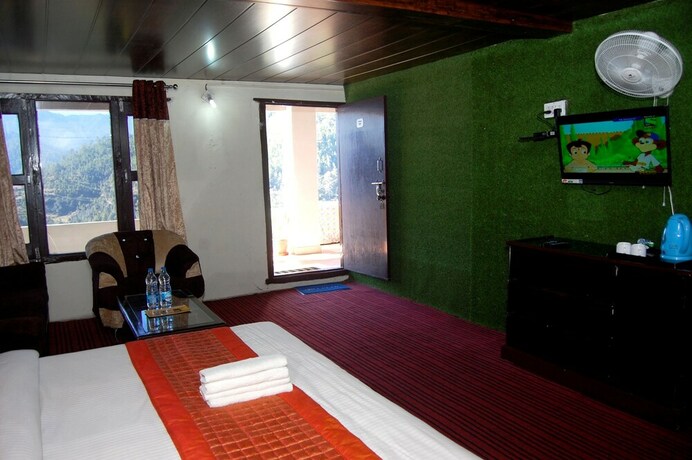 Imagen de la habitación del Hotel Kausani Retreat. Foto 24
