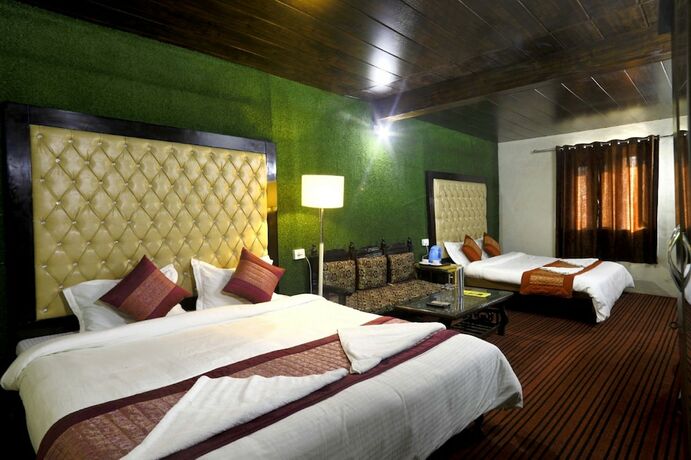 Imagen de la habitación del Hotel Kausani Retreat. Foto 27