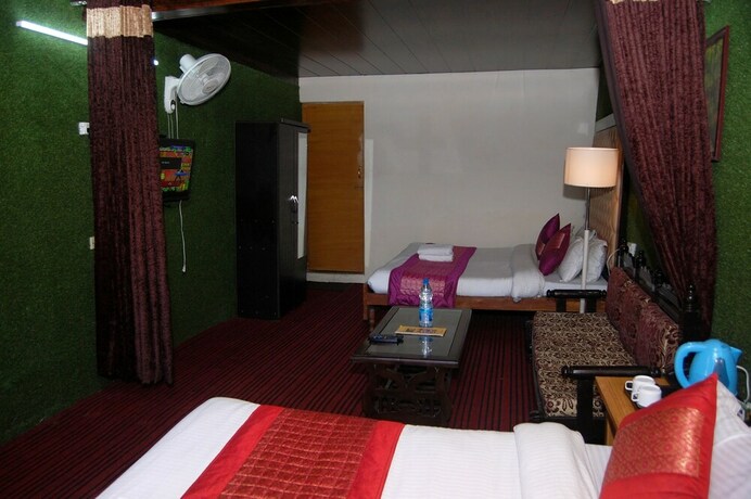 Imagen de la habitación del Hotel Kausani Retreat. Foto 28