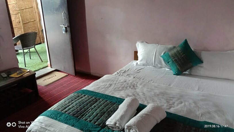 Imagen de la habitación del Hotel Kausani Retreat. Foto 37