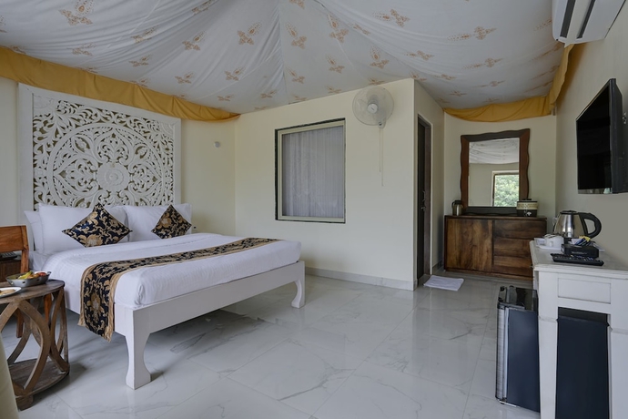 Imagen de la habitación del Hotel Kavish Holiday Hill Resort. Foto 7