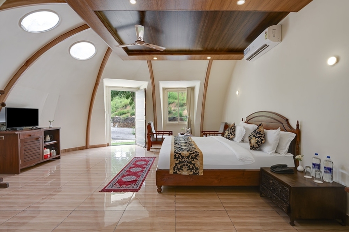 Imagen de la habitación del Hotel Kavish Holiday Hill Resort. Foto 10