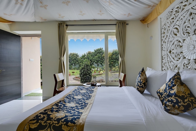 Imagen de la habitación del Hotel Kavish Holiday Hill Resort. Foto 14