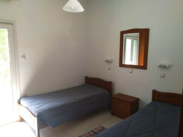 Imagen de la habitación del Hotel Kavousanos Apartments. Foto 19