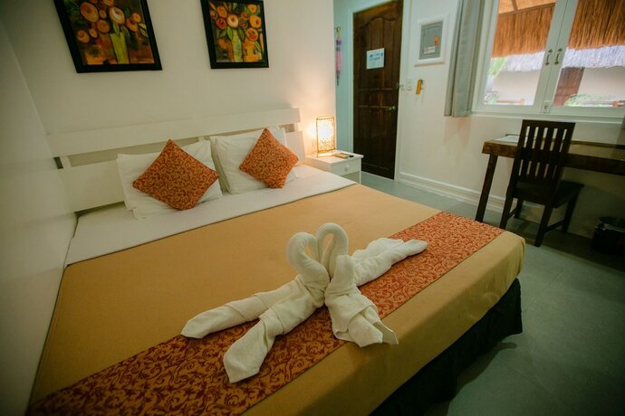 Imagen de la habitación del Hotel Kav's Beach Resort. Foto 17