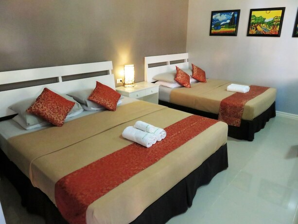 Imagen de la habitación del Hotel Kav's Beach Resort. Foto 23