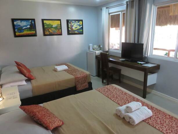 Imagen de la habitación del Hotel Kav's Beach Resort. Foto 24