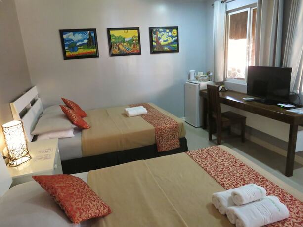 Imagen de la habitación del Hotel Kav's Beach Resort. Foto 28