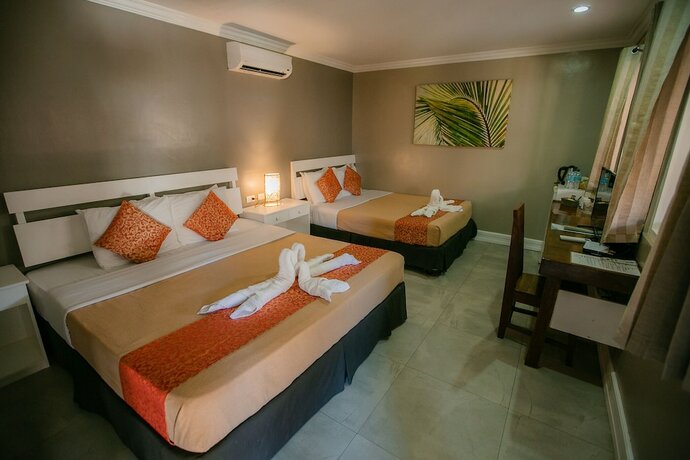 Imagen de la habitación del Hotel Kav's Beach Resort. Foto 32