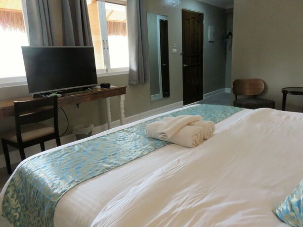 Imagen de la habitación del Hotel Kav's Beach Resort. Foto 33