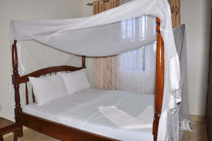 Imagen de la habitación del Hotel Kavumba Recreation Center. Foto 17