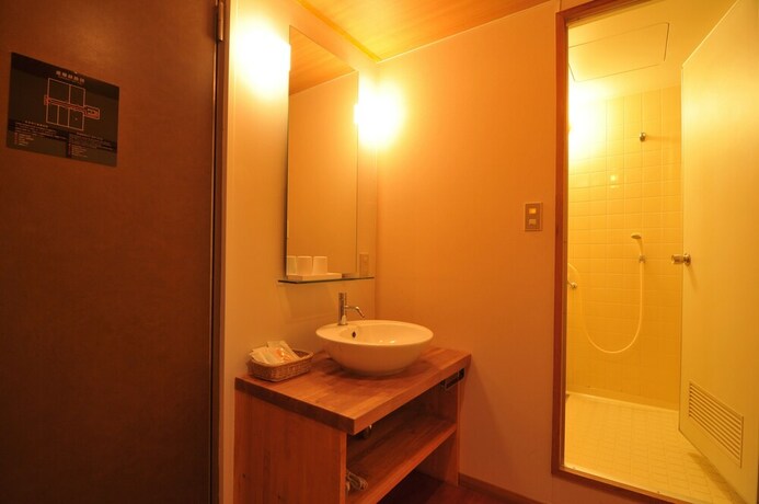 Imagen de la habitación del Hotel Kawamotoya. Foto 7