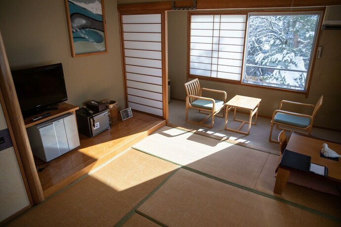 Imagen de la habitación del Hotel Kawamotoya. Foto 8