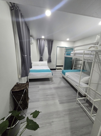 Imagen de la habitación del Hotel Kawan Beach House and Sanctuary. Foto 5