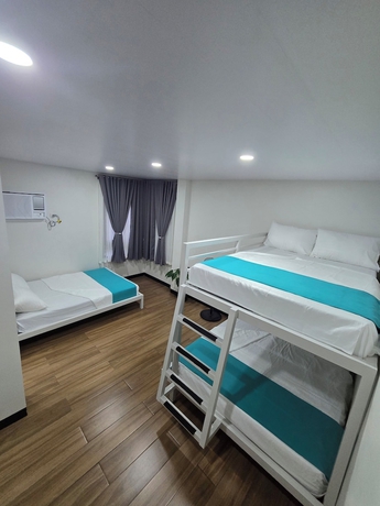 Imagen de la habitación del Hotel Kawan Beach House and Sanctuary. Foto 10