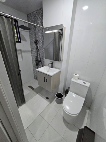 Imagen de la habitación del Hotel Kawan Beach House and Sanctuary. Foto 13