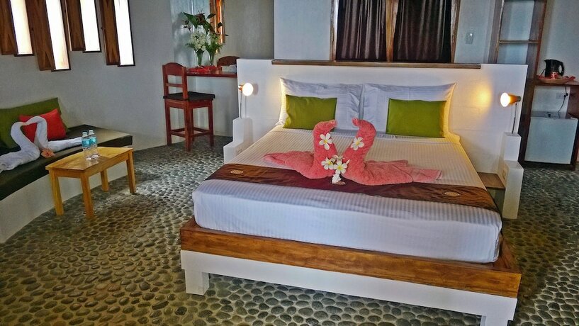 Imagen de la habitación del Hotel Kawayan Holiday Resort. Foto 16