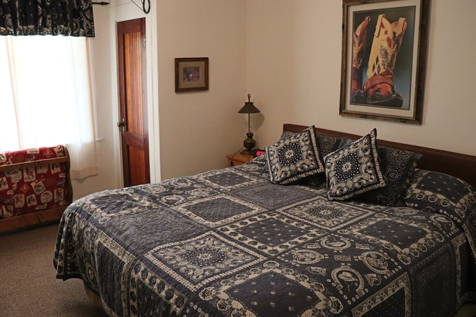Imagen de la habitación del Hotel Kay El Bar Guest Ranch. Foto 5