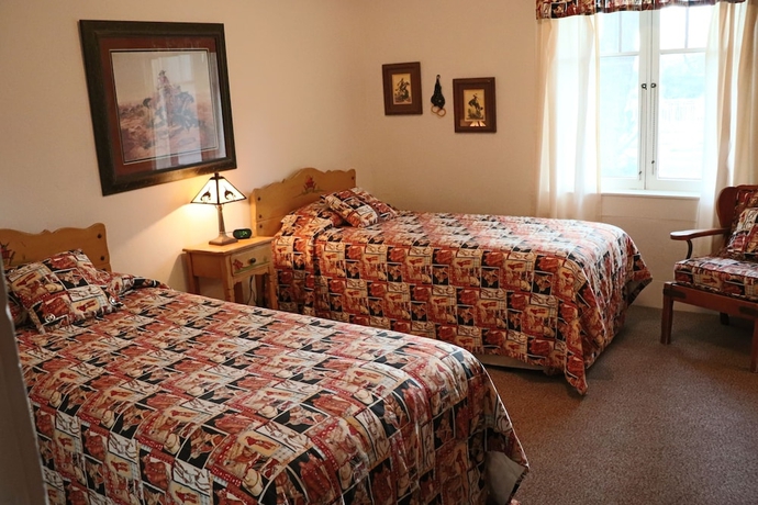 Imagen de la habitación del Hotel Kay El Bar Guest Ranch. Foto 9