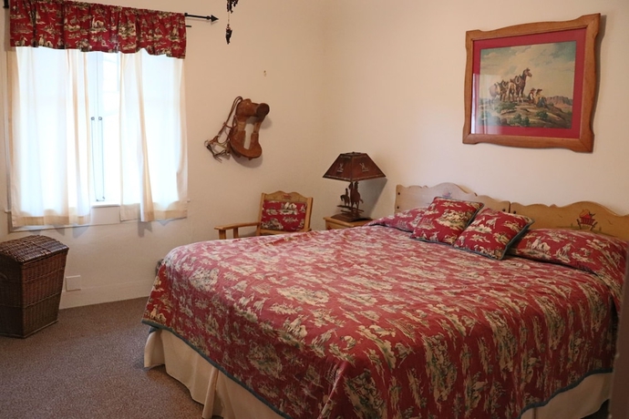 Imagen de la habitación del Hotel Kay El Bar Guest Ranch. Foto 11