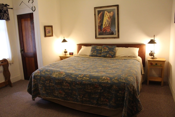 Imagen de la habitación del Hotel Kay El Bar Guest Ranch. Foto 12