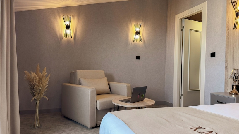 Imagen de la habitación del Hotel Kaya Home. Foto 8
